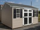 10x14 Peak Style Portable Storage Shed with Pebble Clay Vinyl Siding, Black Wood Doors, and Shelves Built Inside